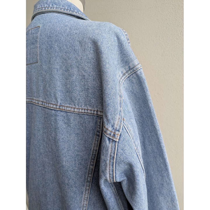 Giubbino in jeans vintage Mash, lavaggio chiaro, iconico.  Tasche esterne classiche ma interne.